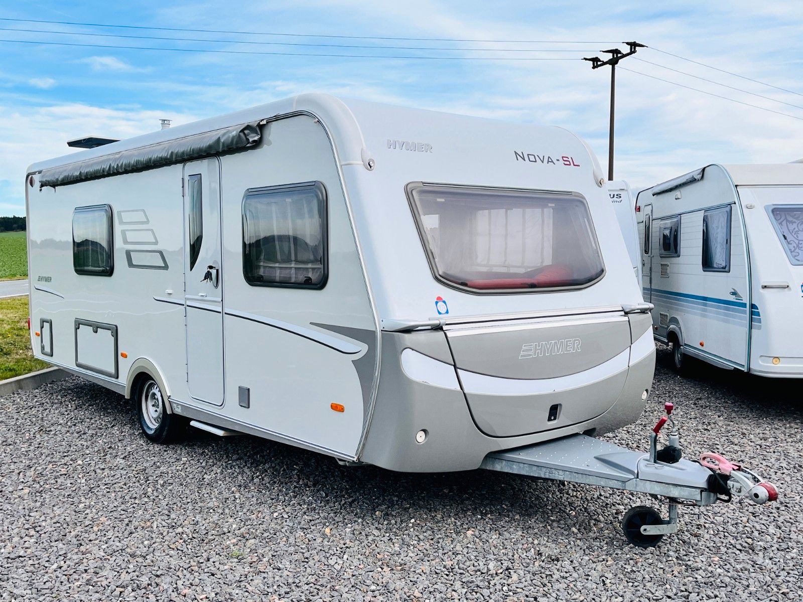 Fahrzeugabbildung HYMER / ERIBA / HYMERCAR Nova 580 SL Heckbad Einzelbetten MOVER KLIMA